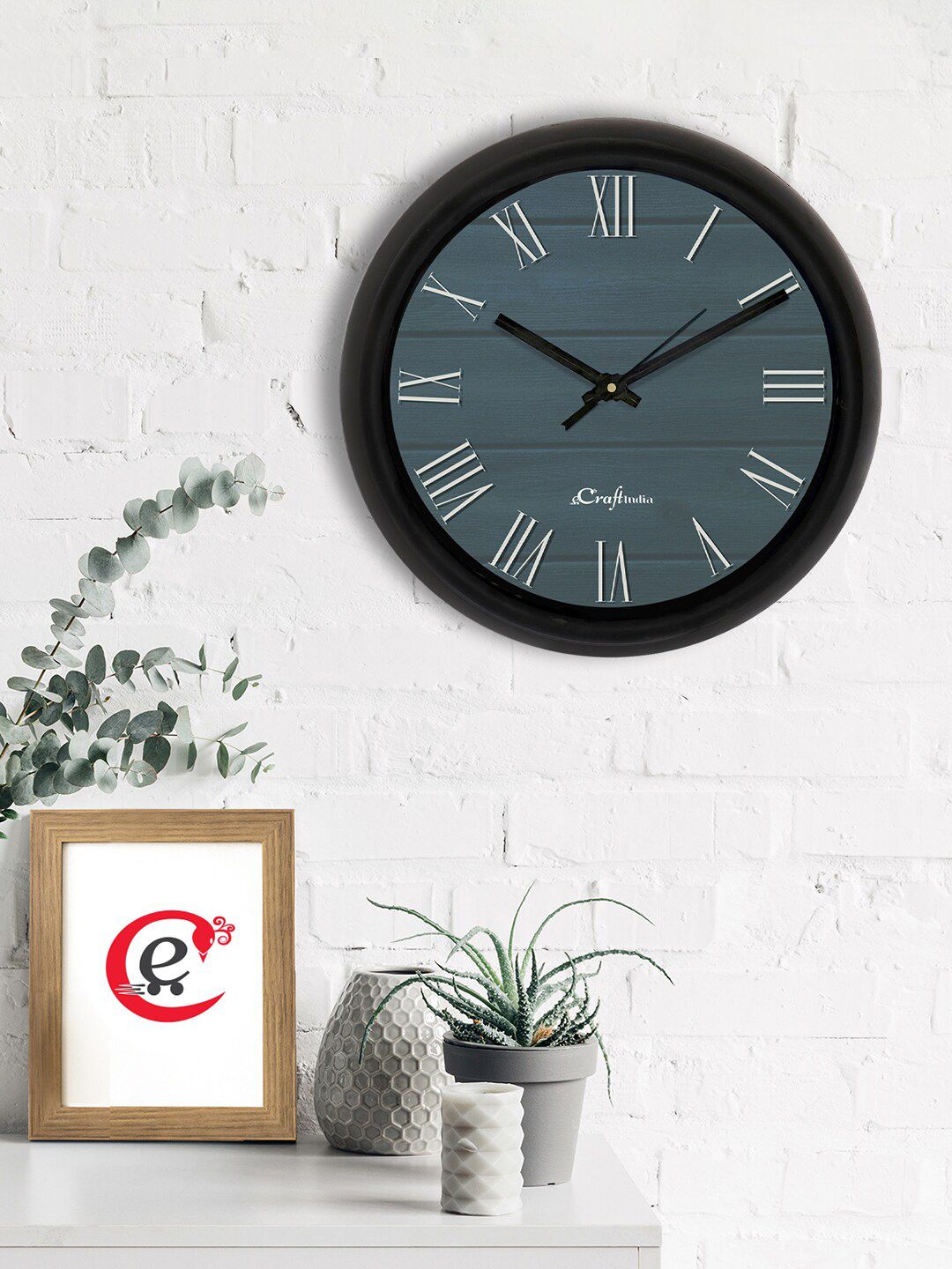 eCraftIndia Blue & Black Printed Contemporary Analogue Wall Clock Price in India
