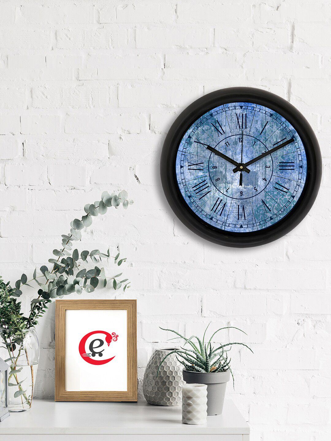 eCraftIndia Blue & Black Printed Contemporary Analogue Wall Clock Price in India