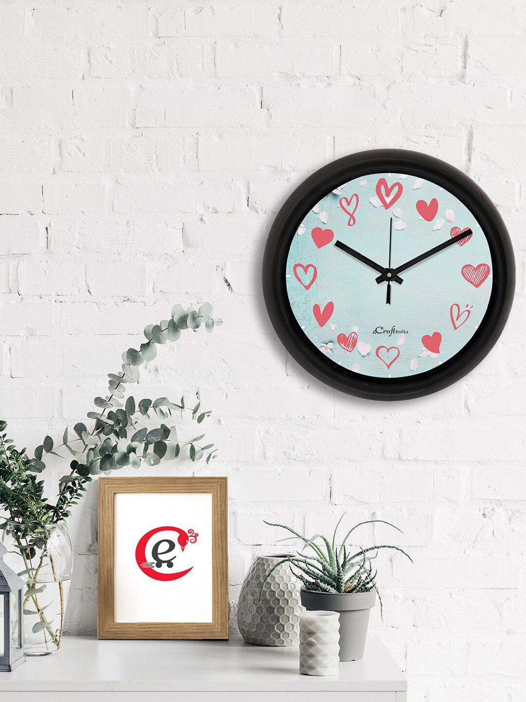 eCraftIndia Blue & Pink Printed Contemporary Analogue Wall Clock Price in India