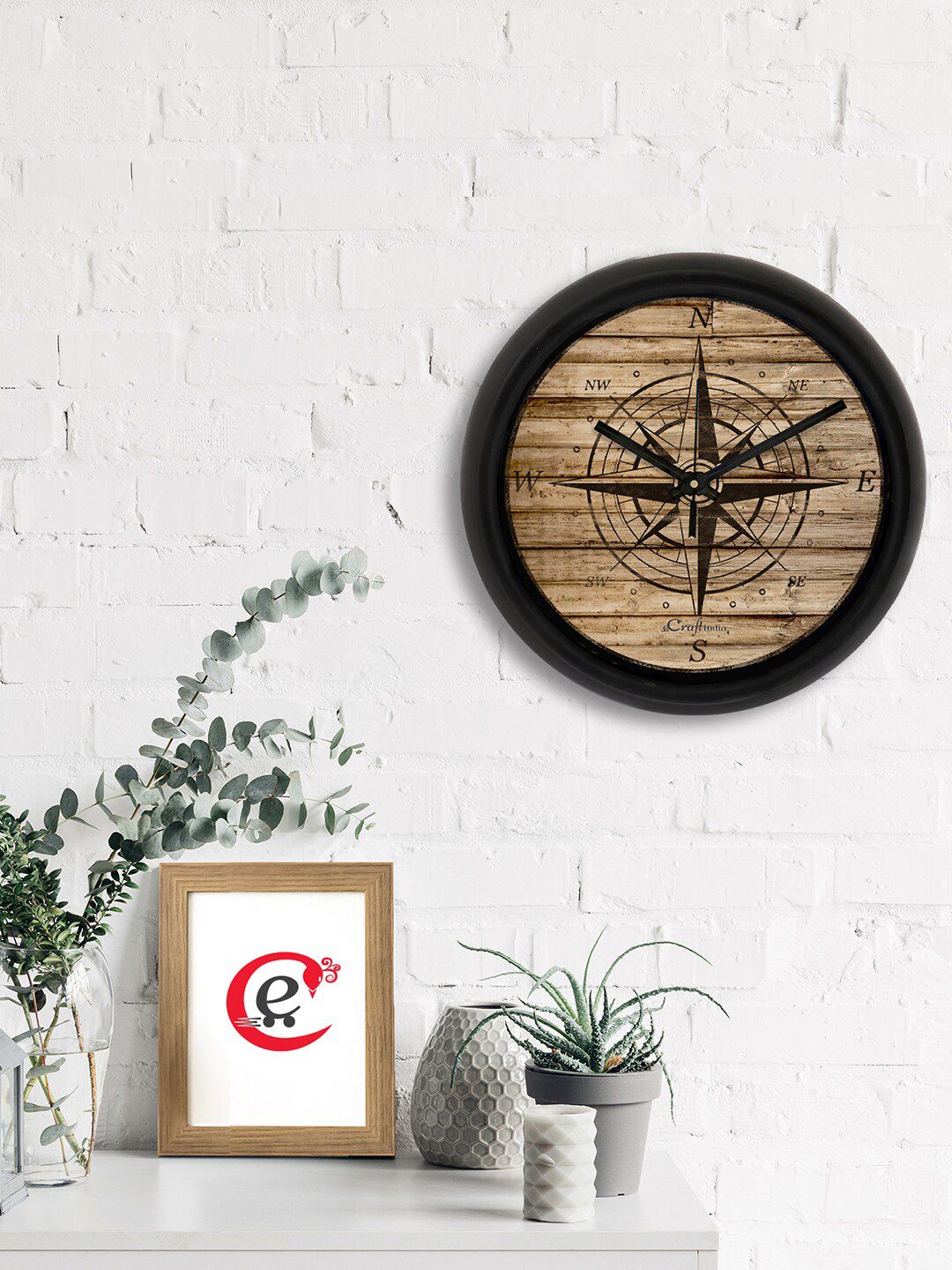 eCraftIndia Brown & Black Compass Printed Contemporary Analogue Wall Clock Price in India