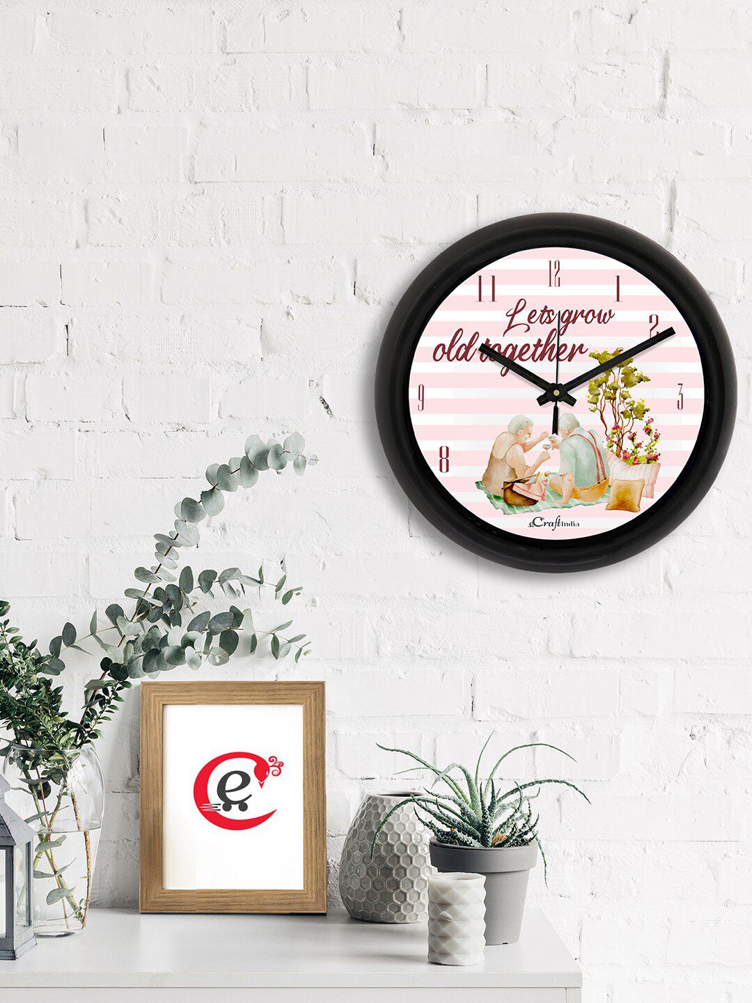 eCraftIndia Pink & White Printed Contemporary Analogue Wall Clock Price in India