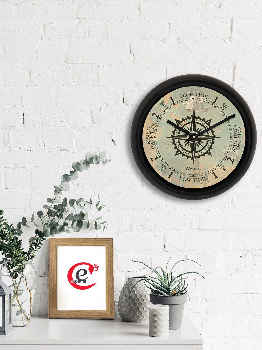 eCraftIndia Green & Black Compass Printed Contemporary Analogue Wall Clock Price in India