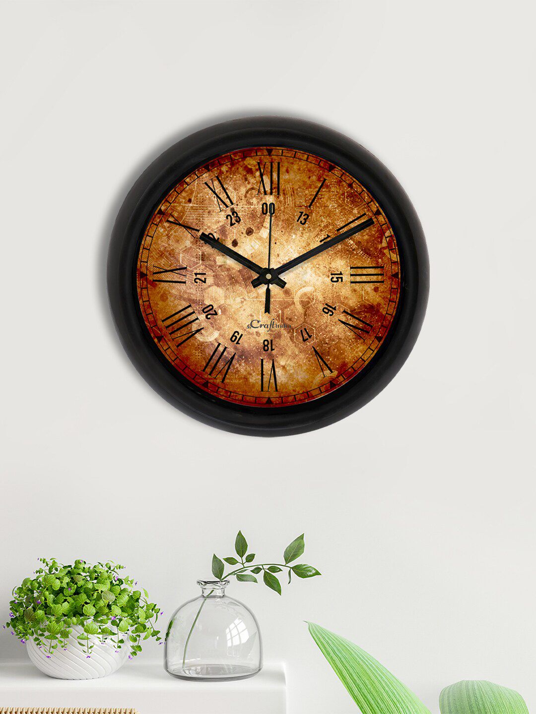 eCraftIndia Brown & Black Printed Contemporary Analogue Wall Clock Price in India