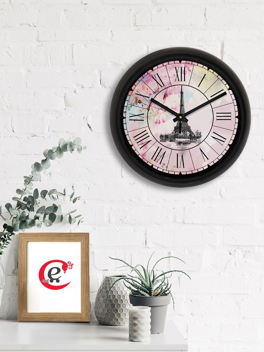 eCraftIndia Pink & Black Effiel Tower Printed Contemporary Analogue Wall Clock Price in India