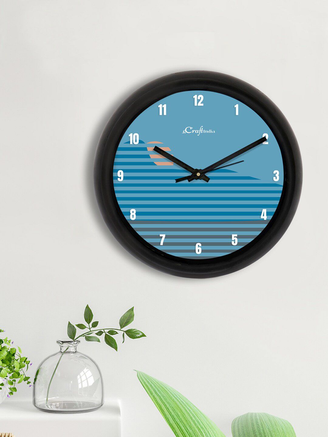 eCraftIndia Blue & Black Printed Contemporary Analogue Wall Clock Price in India