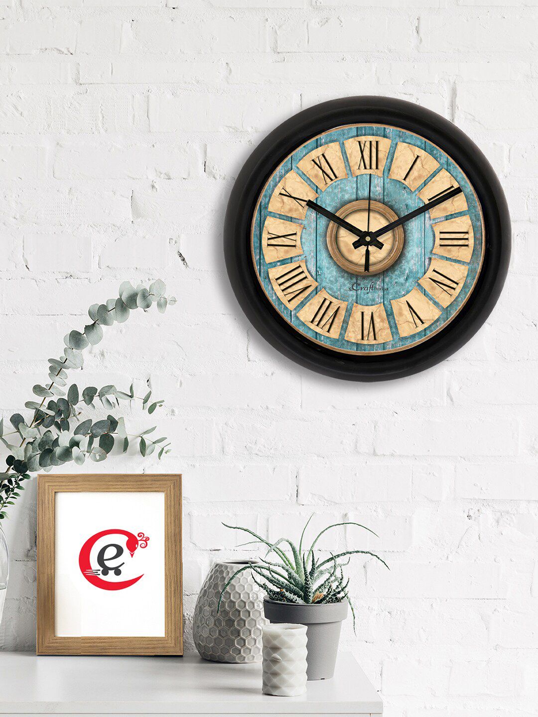 eCraftIndia Black & Blue Printed Contemporary Analogue Wall Clock Price in India