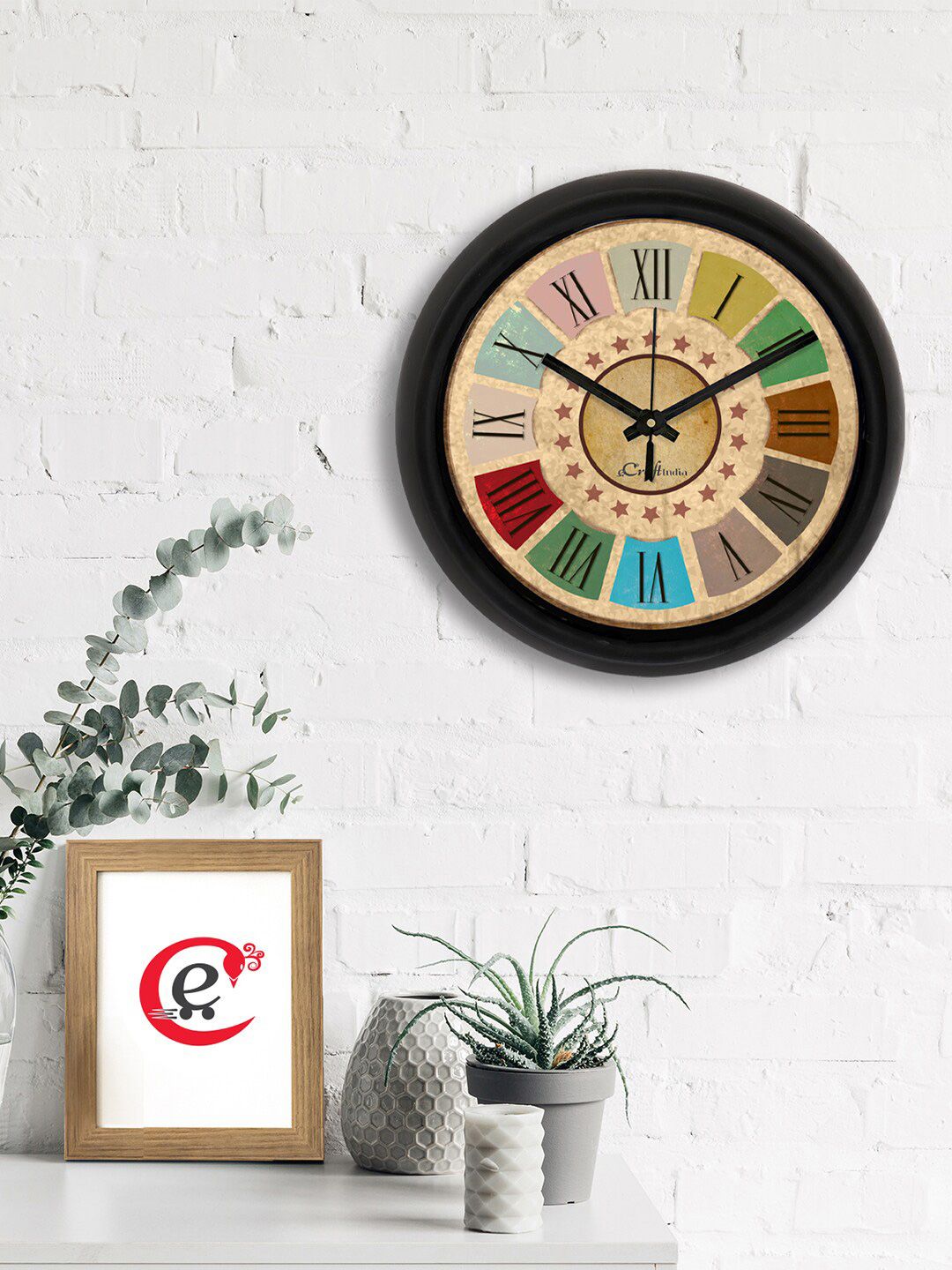 eCraftIndia Brown & Pink Printed Contemporary Wall Clock Price in India