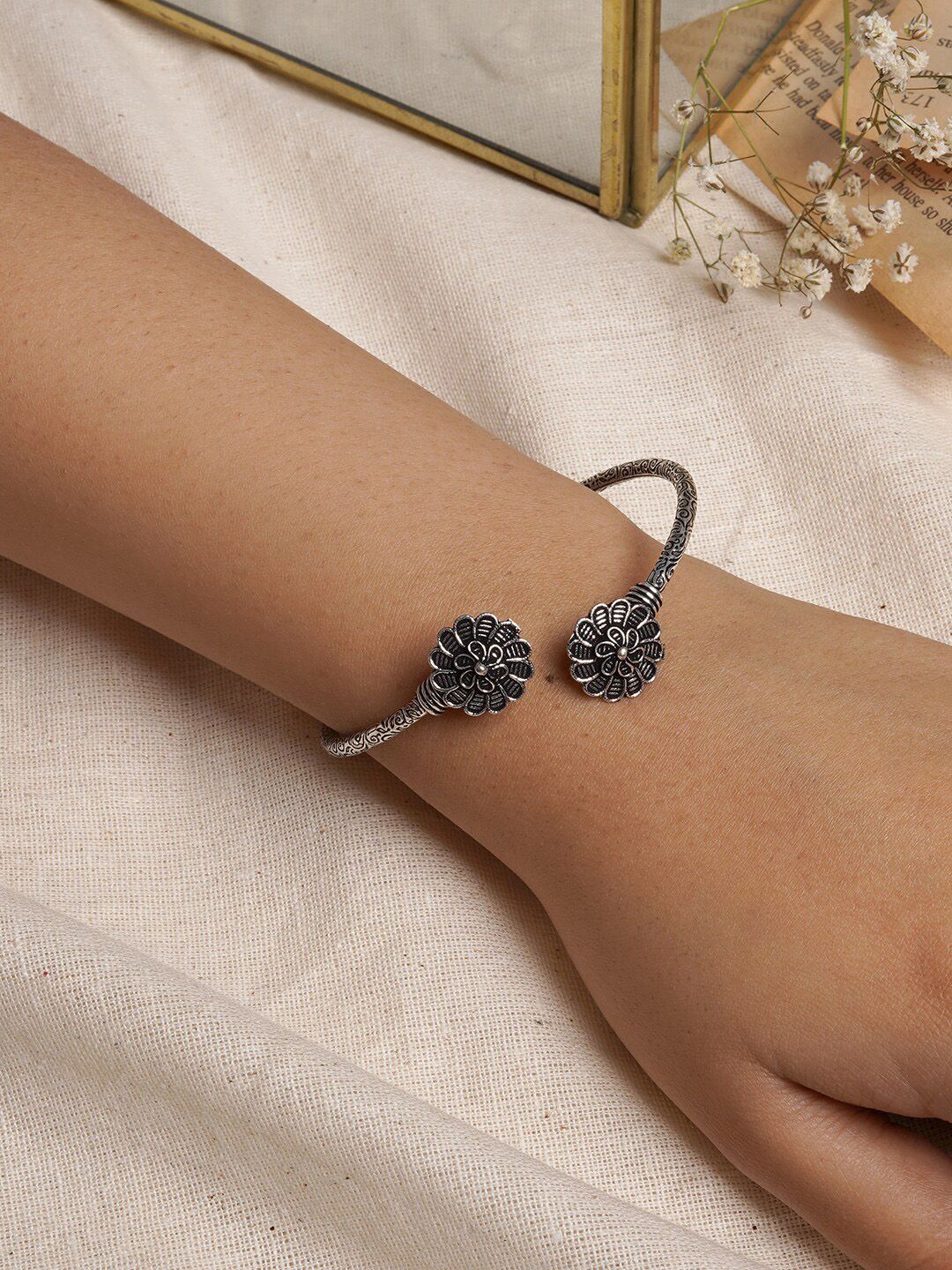 TEEJH Women Silver-Toned Oxidised Silver-Plated Bangle-Style Bracelet Price in India