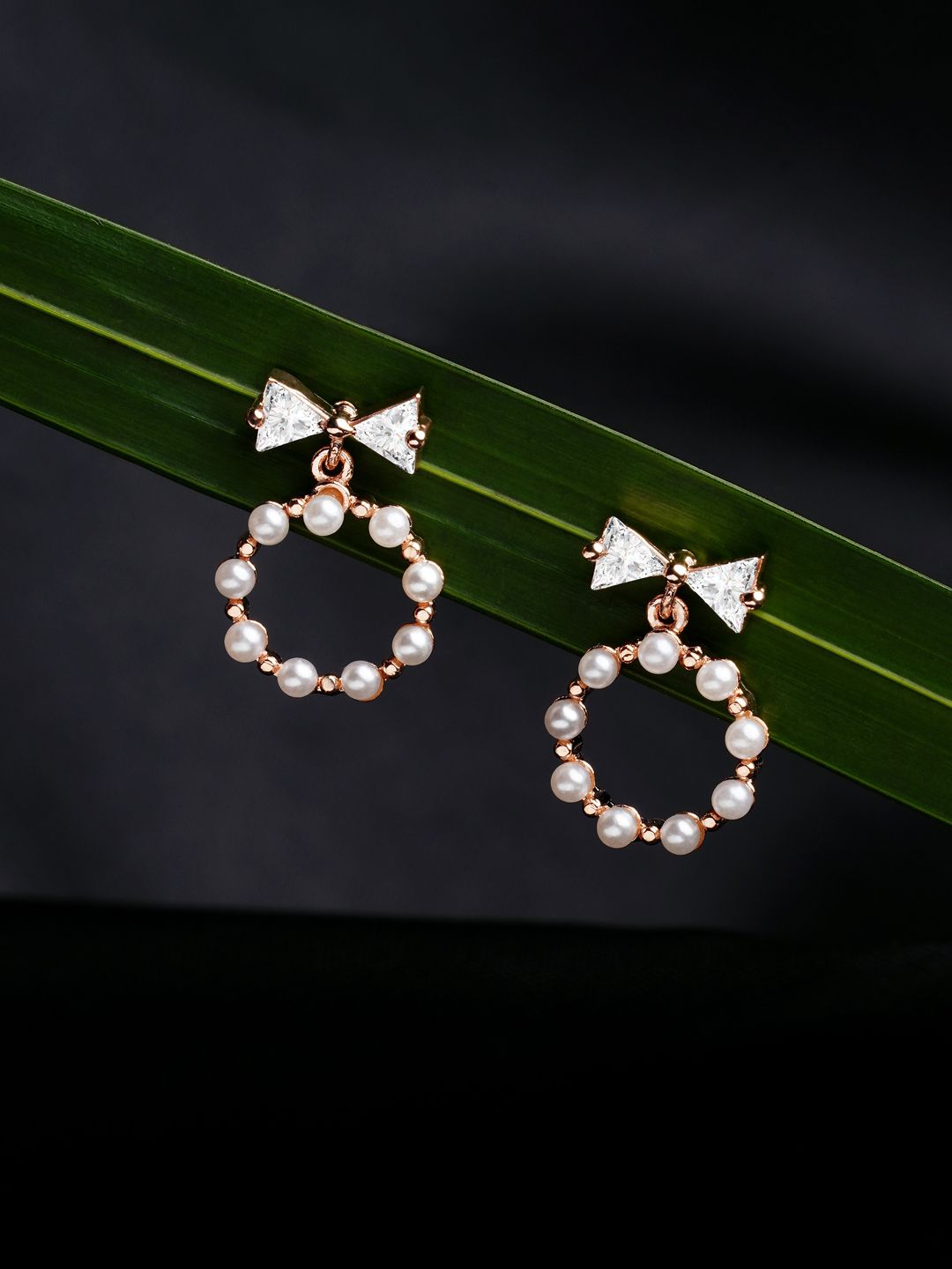 AMI Rose Gold Plated White Contemporary Cubic Zirconia Bow Drop Earrings Price in India