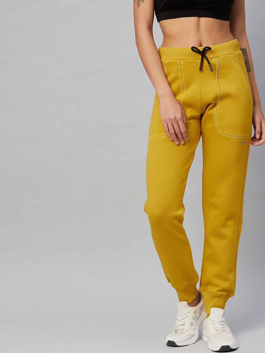 C9 AIRWEAR Women Mustard Yellow Solid Fleece Joggers Price in India