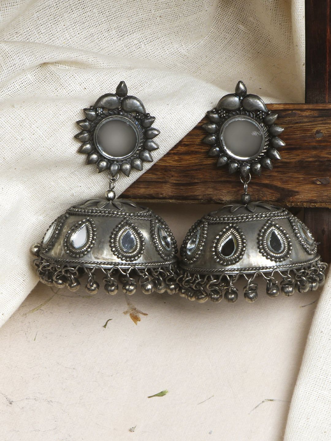 TEEJH Silver-Plated Dome Shaped Jhumkas Earrings Price in India