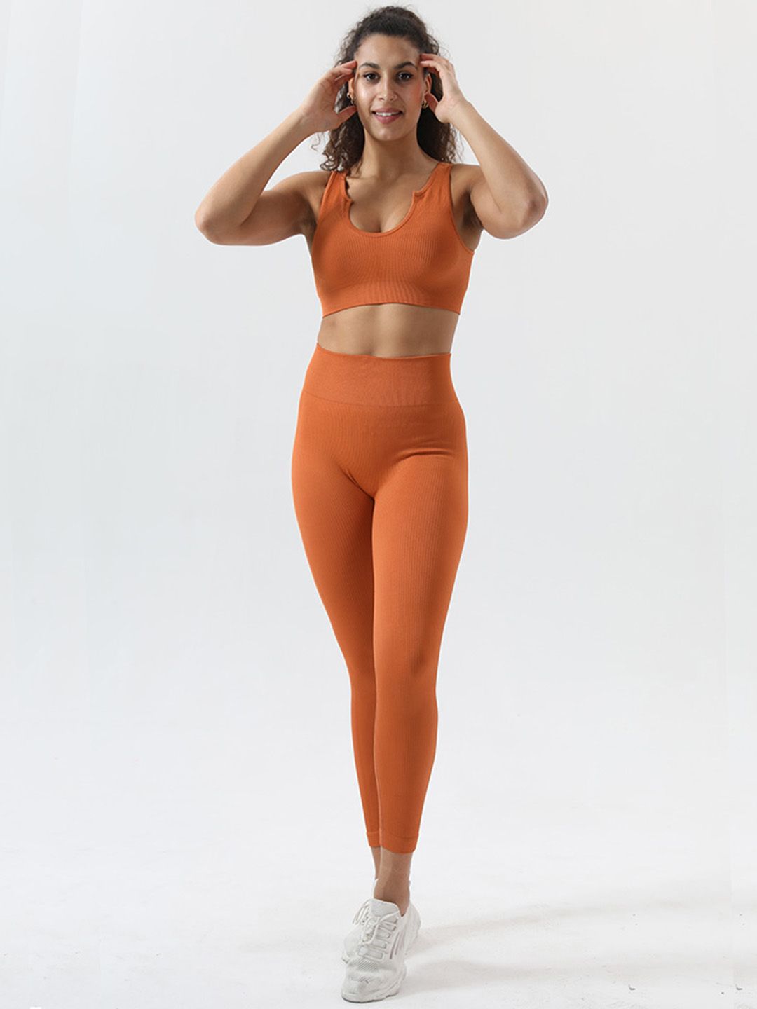 URBANIC Women Orange Solid Slim Fit Gym Track Suit Price in India