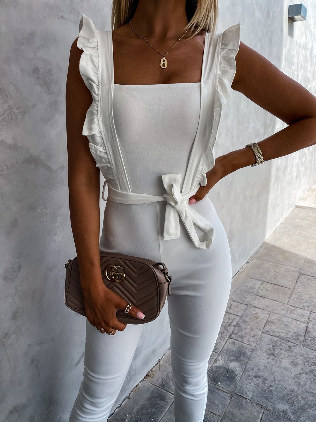 URBANIC White Solid Ruffled Basic Jumpsuit With Belt Price in India