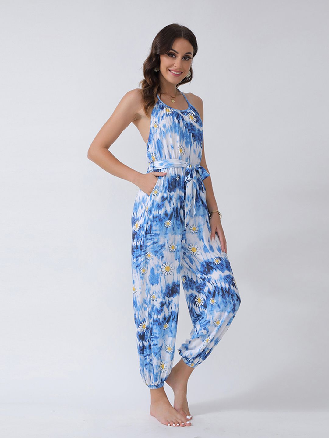 URBANIC Blue & White Halter Neck Belted Printed Basic Jumpsuit Price in India