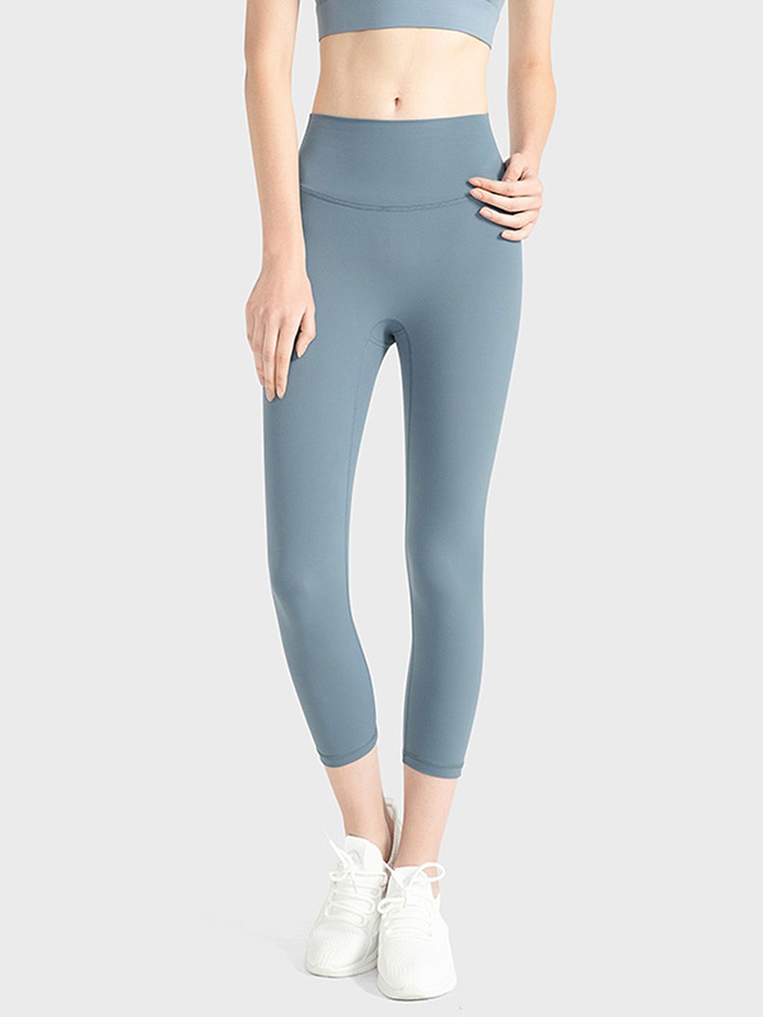 URBANIC Women Blue Solid Gym Crop Tights Price in India