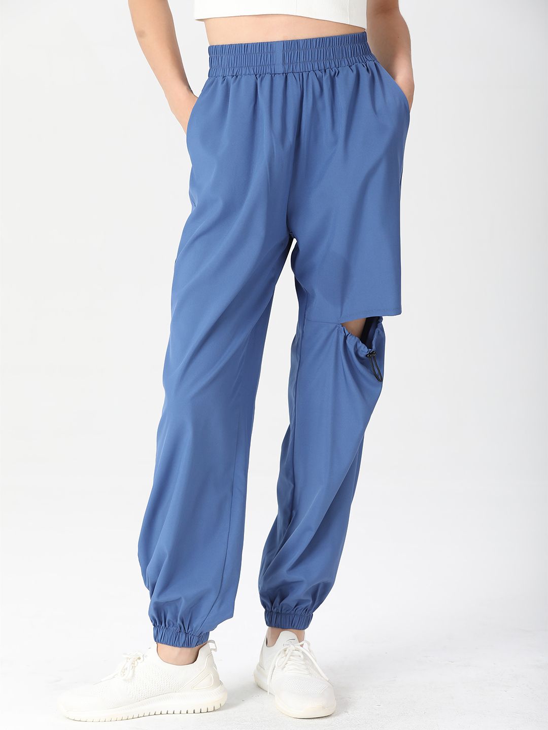 URBANIC Women Blue Solid Slash Knee Relaxed Fit Joggers Price in India