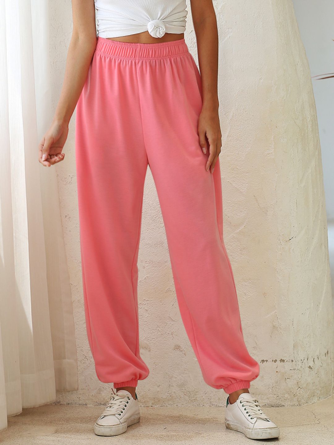 URBANIC Women Pink Solid Joggers Price in India