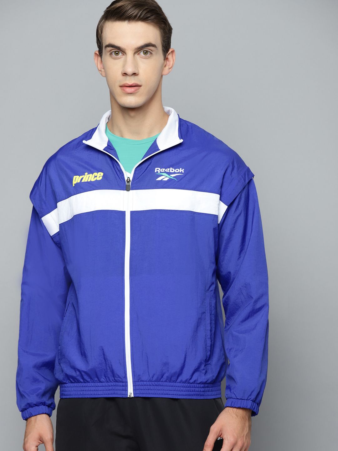 Reebok Unisex Blue RXP Brand Logo Printed Back Sporty Jacket Price in India