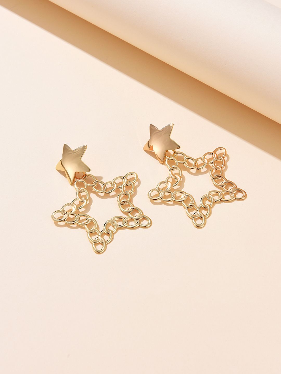 URBANIC Gold-Toned Star Shaped Drop Earrings Price in India