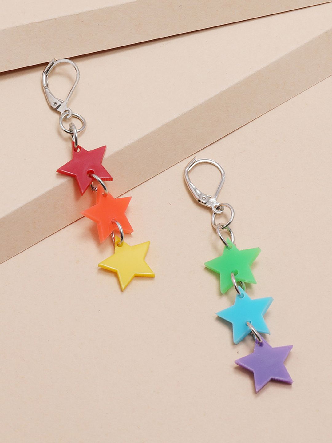 URBANIC Multicoloured Star Shaped Mismatch Drop Earrings Price in India