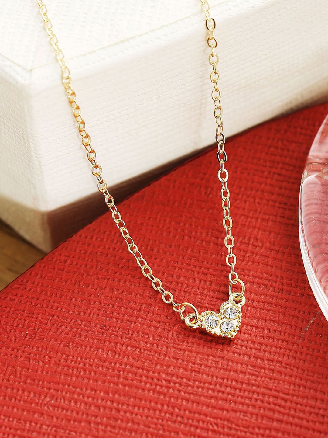 URBANIC Gold-Toned Stone Studded Heart Textured Link Necklace Price in India