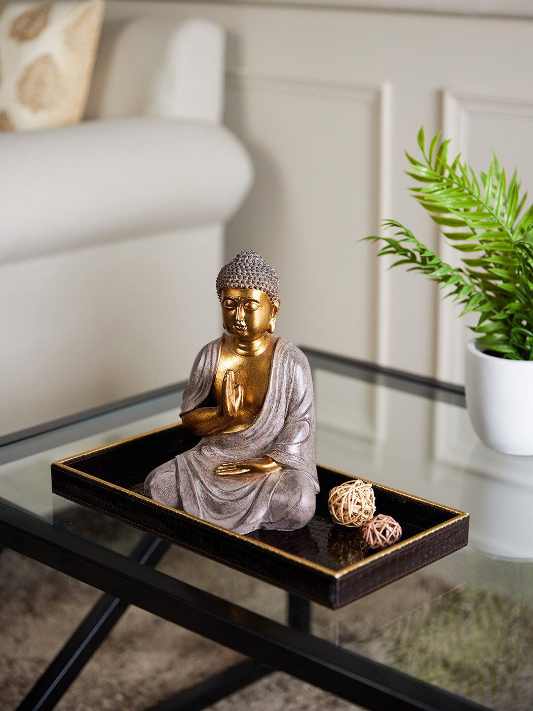 Pure Home and Living Gold-Toned Buddha Showpiece Price in India