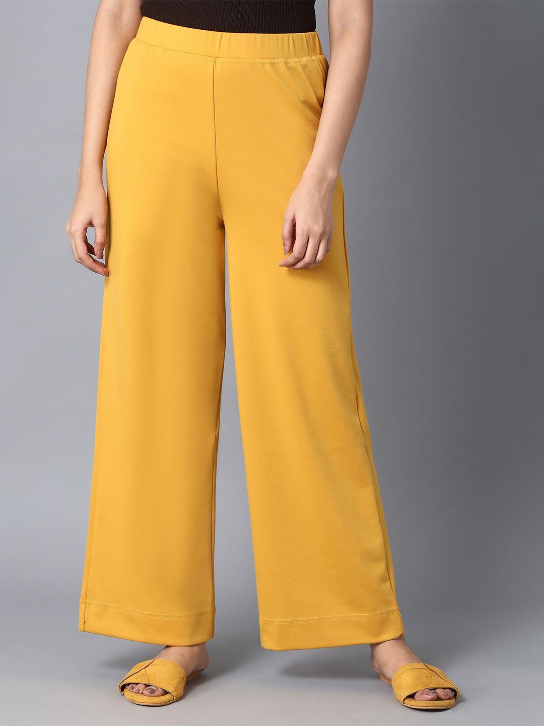 elleven Women Yellow Knitted Wide Leg Palazzos Price in India