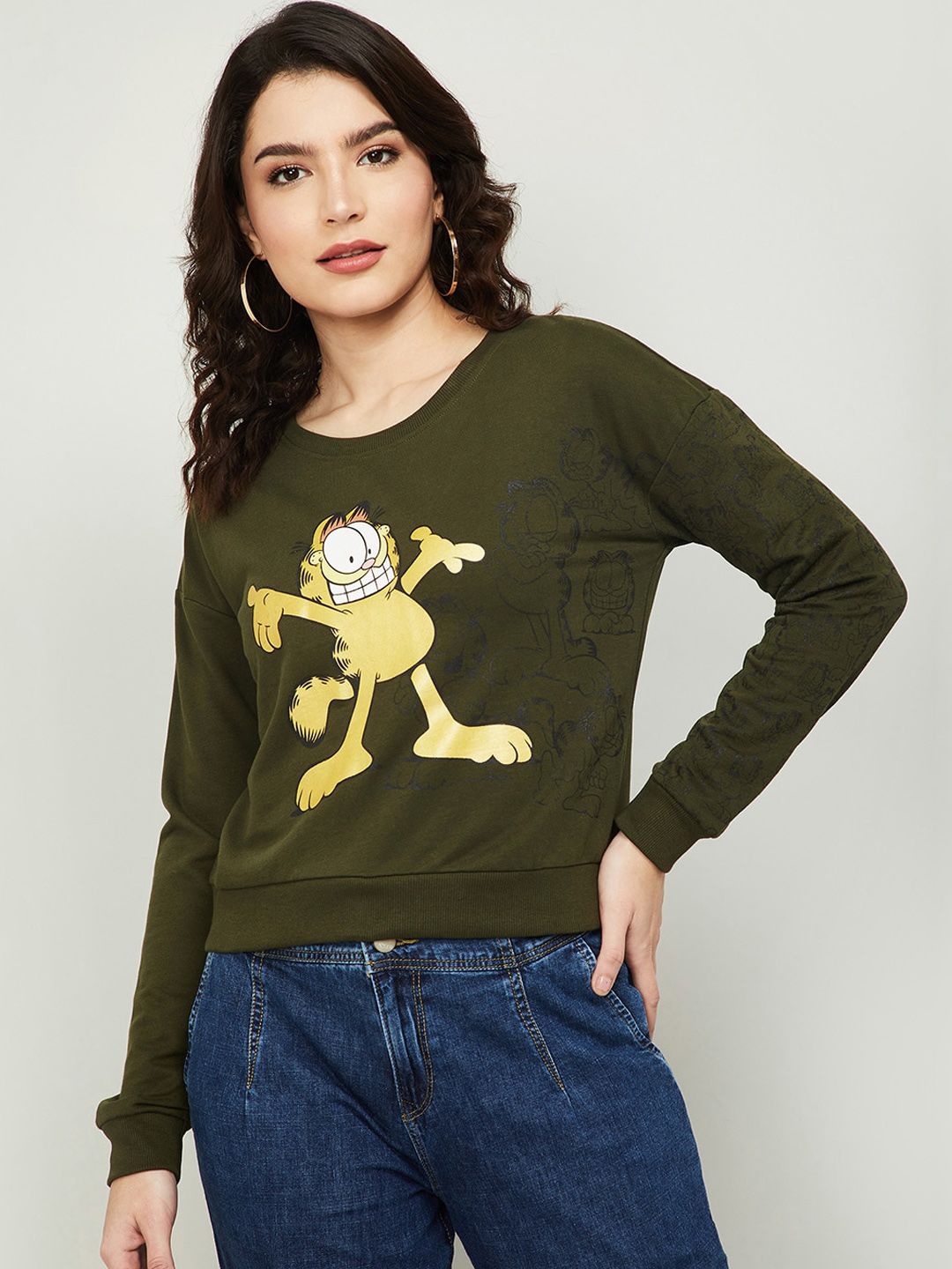 Ginger by Lifestyle Women Olive Green Garfield Printed Sweatshirt Price in India