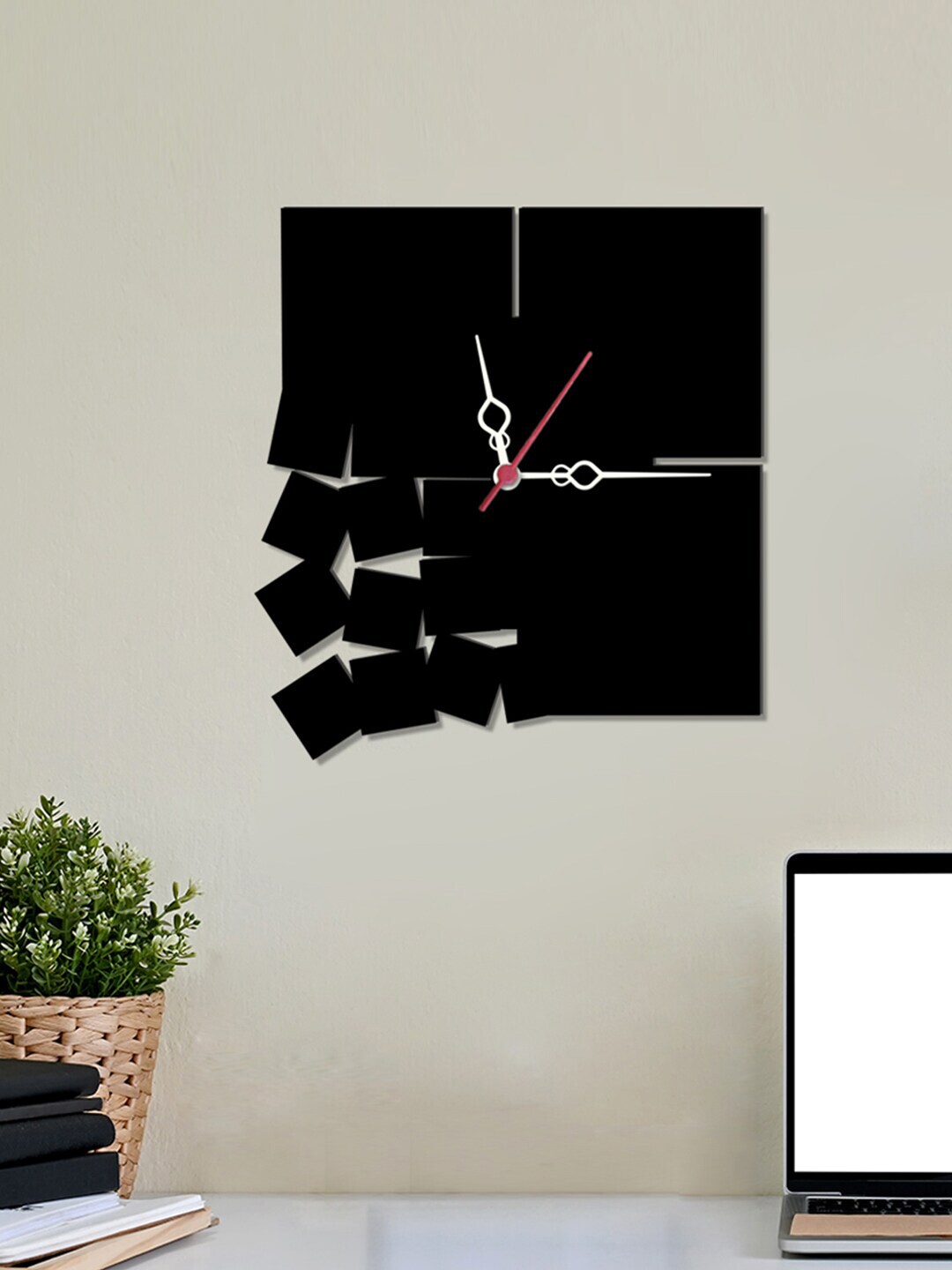 WALLMANTRA Black Abstract Shaped Contemporary Wall Clock Price in India
