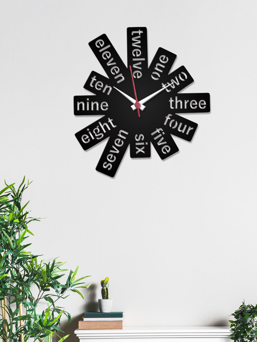 WALLMANTRA Black & White Printed Abstract Shaped Contemporary Wall Clock Price in India