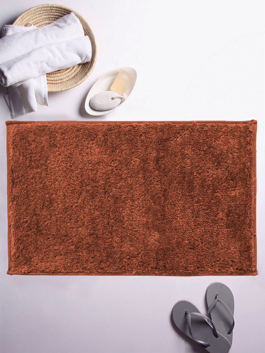 LUXEHOME INTERNATIONAL Rust Solid Rectangular Bath Rug Price in India