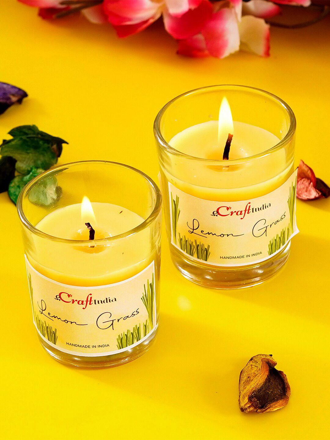 eCraftIndia Set Of 2 Yellow Lemon Grass Scented Glass Candles Price in India
