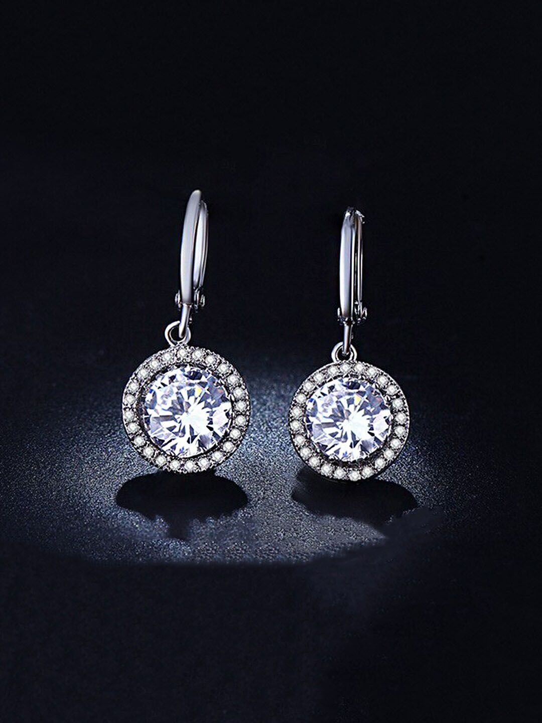 Yellow Chimes Silver-Toned White Crystal Studded Circular Drop Earrings Price in India