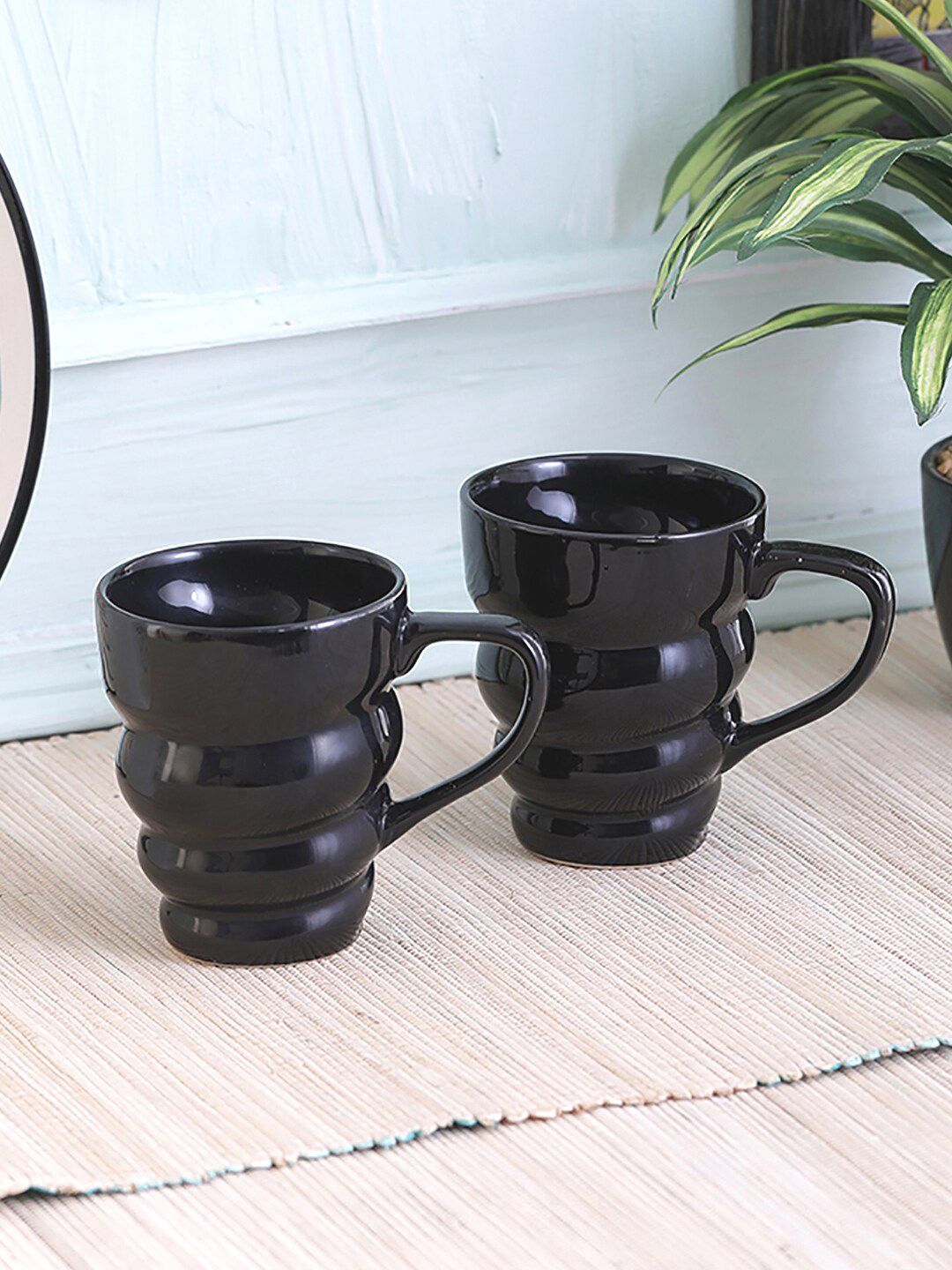 VarEesha Set Of 2 Black Spiral Dishwasher & Microwave Safe Glossy Ceramic Mugs Price in India