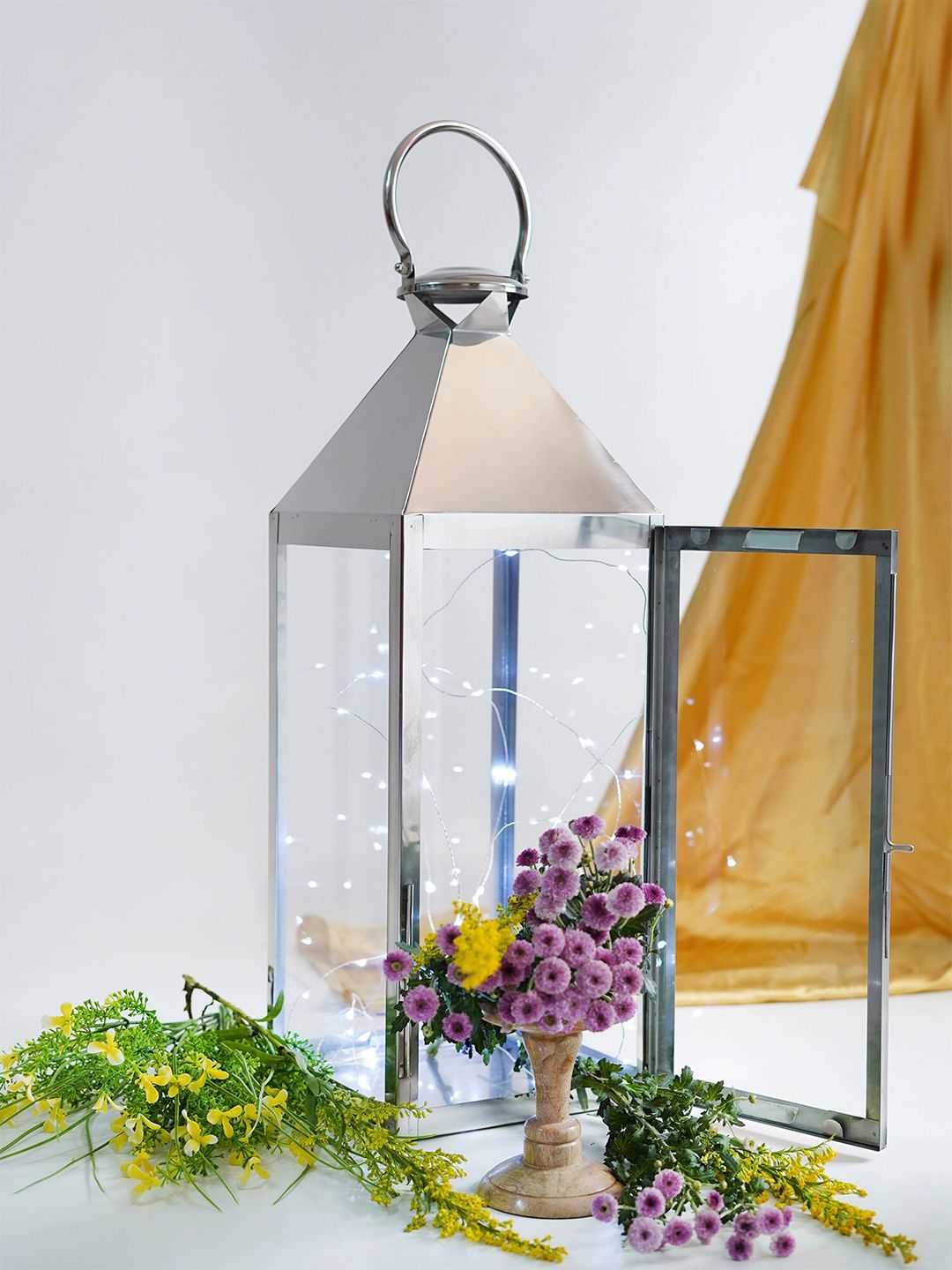 Folkstorys Silver-Toned & Transparent Glass Contemporary Handcrafted Table Lantern Price in India