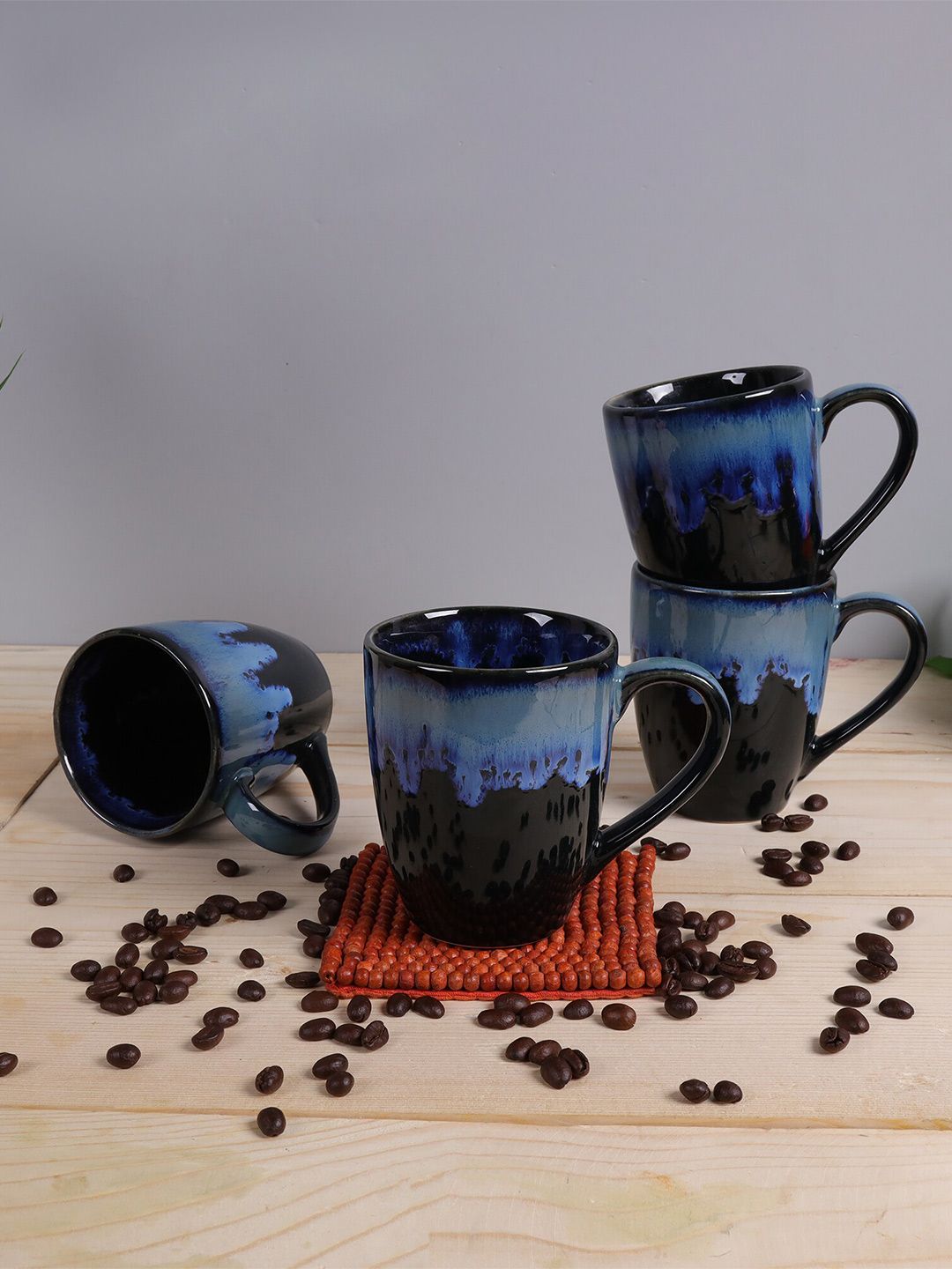 Homesake Set of 4 Black & Blue Printed Ceramic Glossy Mugs Price in India