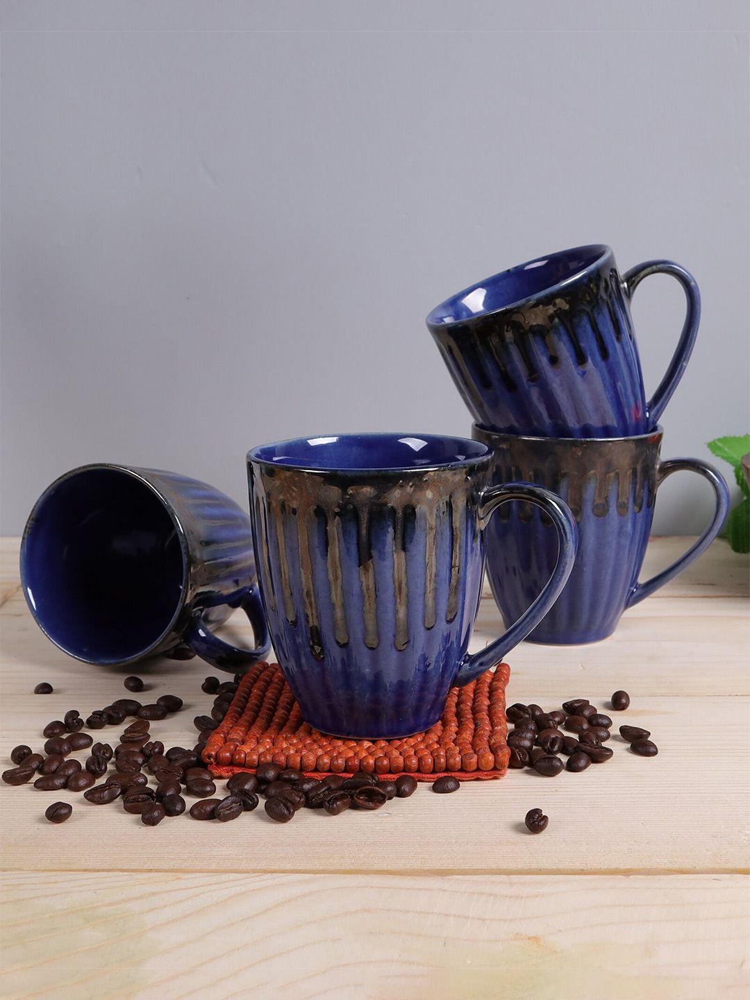 Homesake Set of 4  Blue Printed Ceramic Glossy Mug Price in India