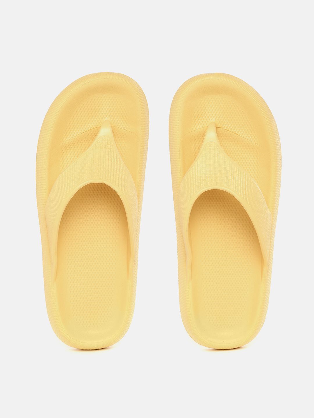 Mast & Harbour Women Yellow Textured Thong Flip-Flops Price in India