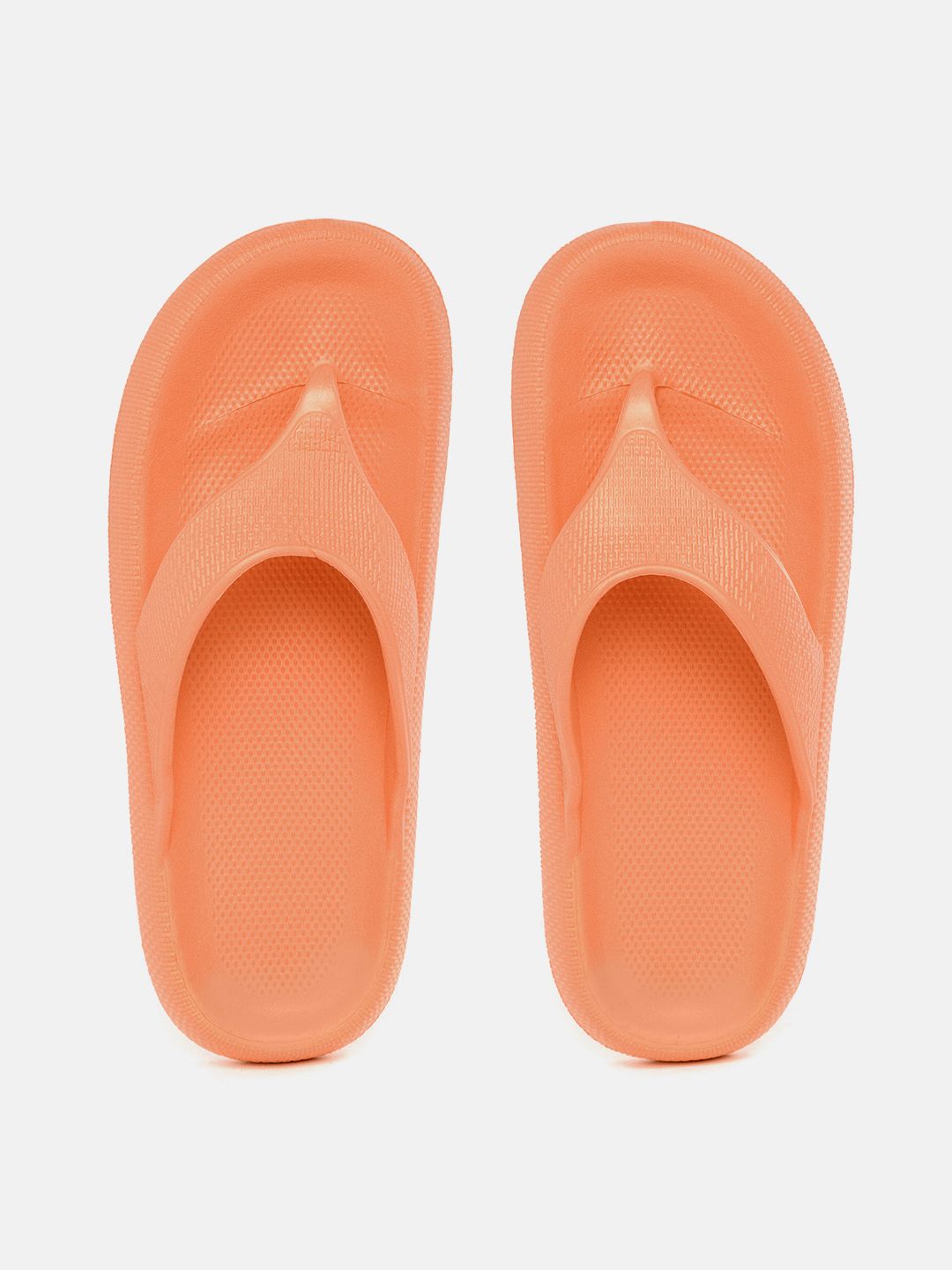 Mast & Harbour Women Orange Textured Thong Flip-Flops Price in India