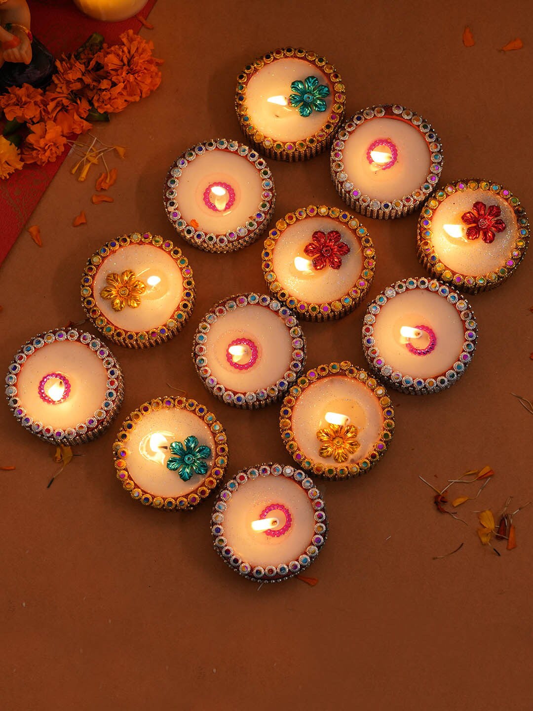 TIED RIBBONS Set of 12  Wax Filled Terracotta Diwali Diyas Price in India
