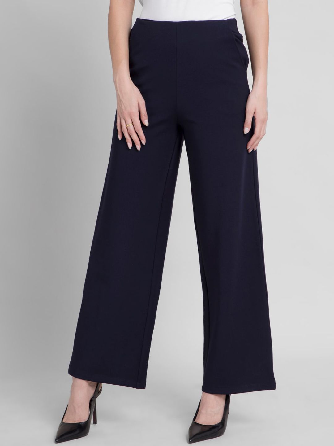 FableStreet Women Navy Blue Solid Flared High-Rise Parallel Trousers Price in India