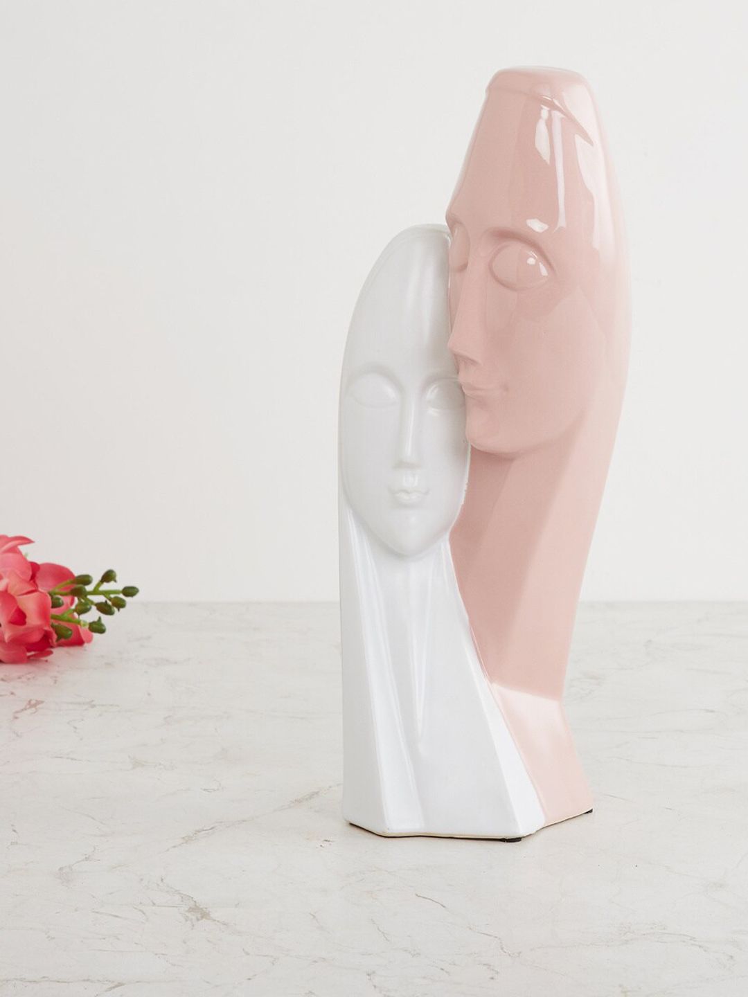 Home Centre White & Pink Solid Stoneware Face Figurine Price in India