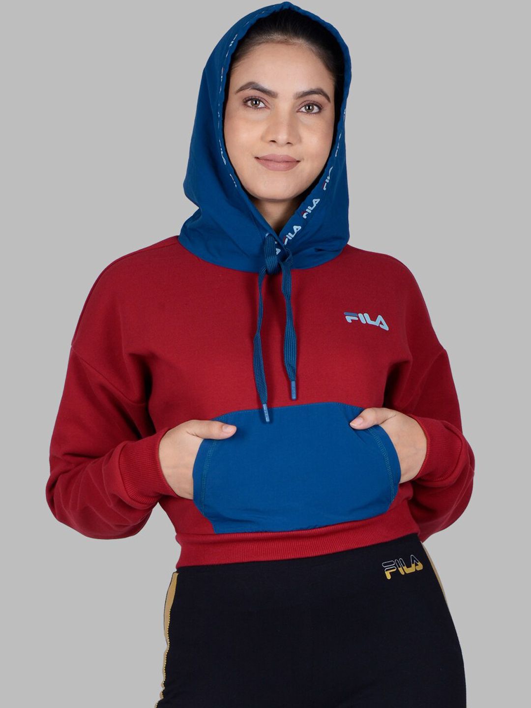 FILA Women Red Colourblocked Hooded Sweatshirt Price in India