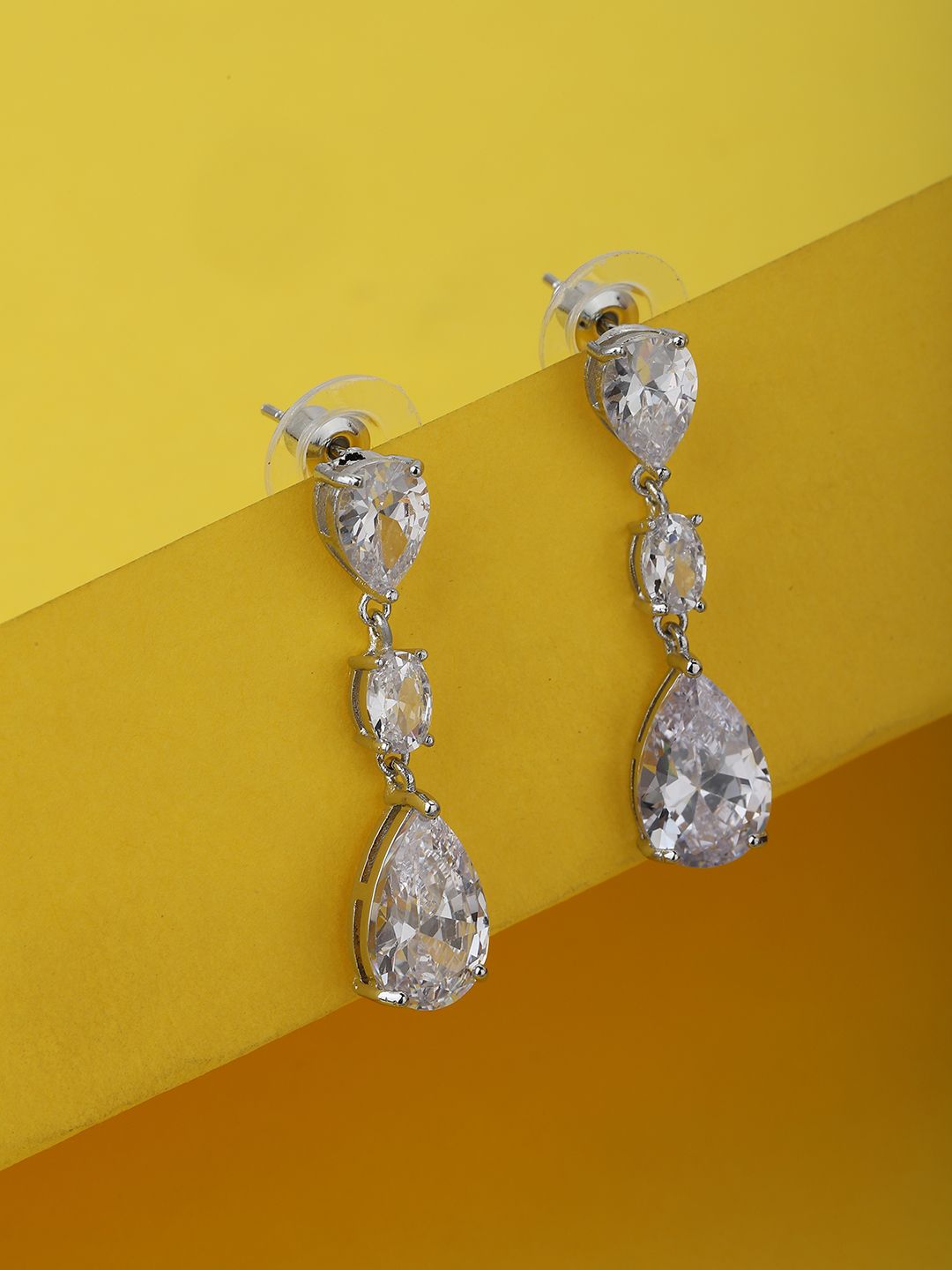 Carlton London Rhodium-Plated Silver-Toned Teardrop Shaped Drop Earrings Price in India