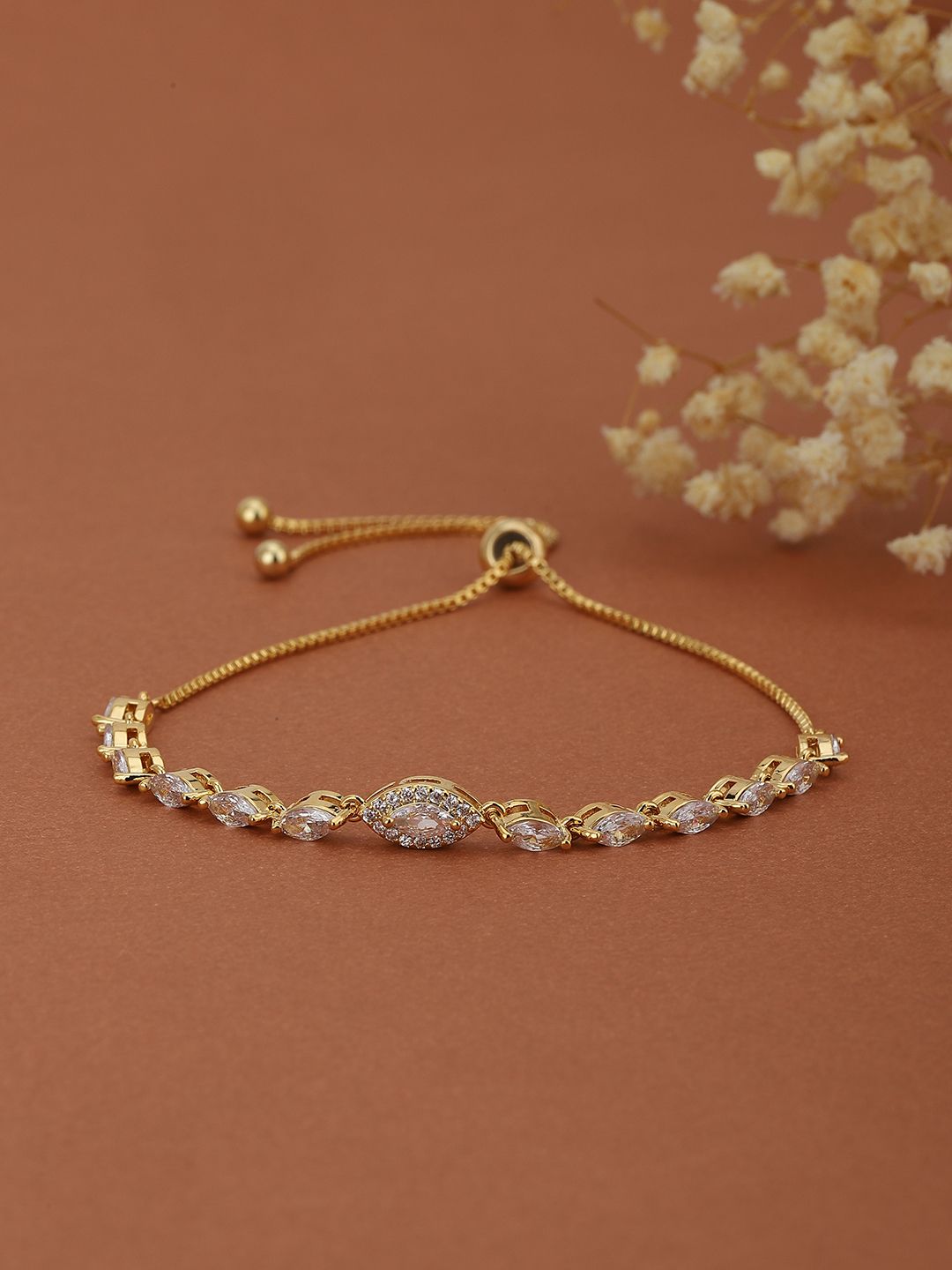 Carlton London Women Gold-Plated Cubic Zirconia Handcrafted Link Bracelet Price in India
