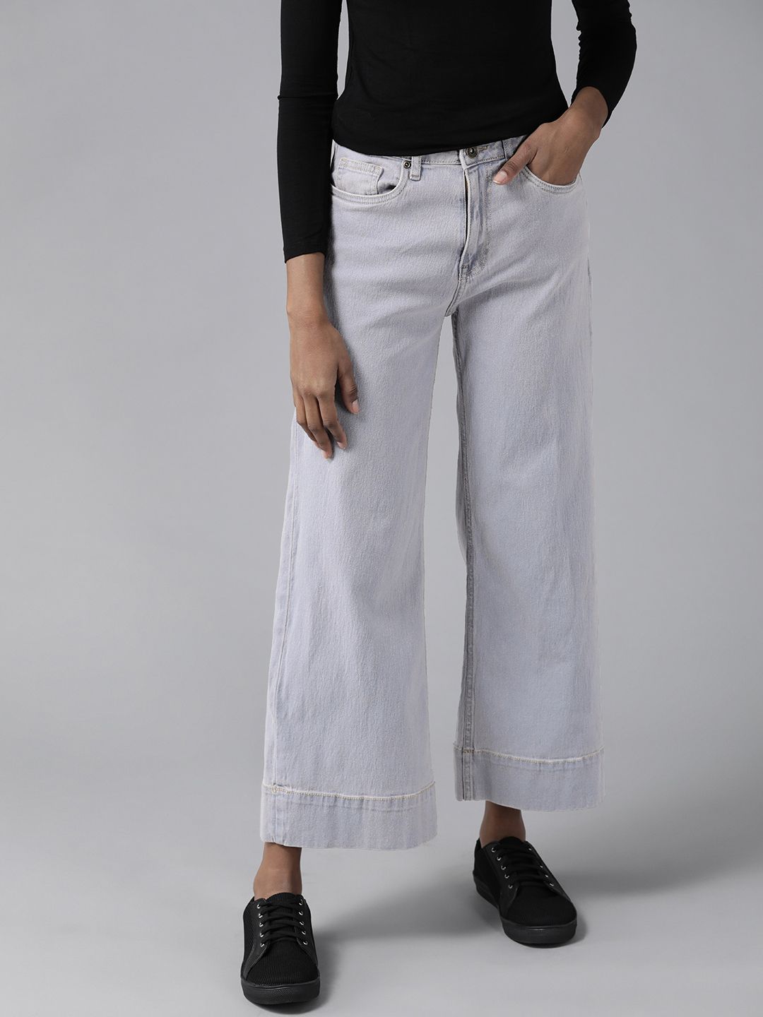 The Roadster Lifestyle Co Women Light Blue Wide Leg High-Rise Light Fade Stretchable Jeans Price in India