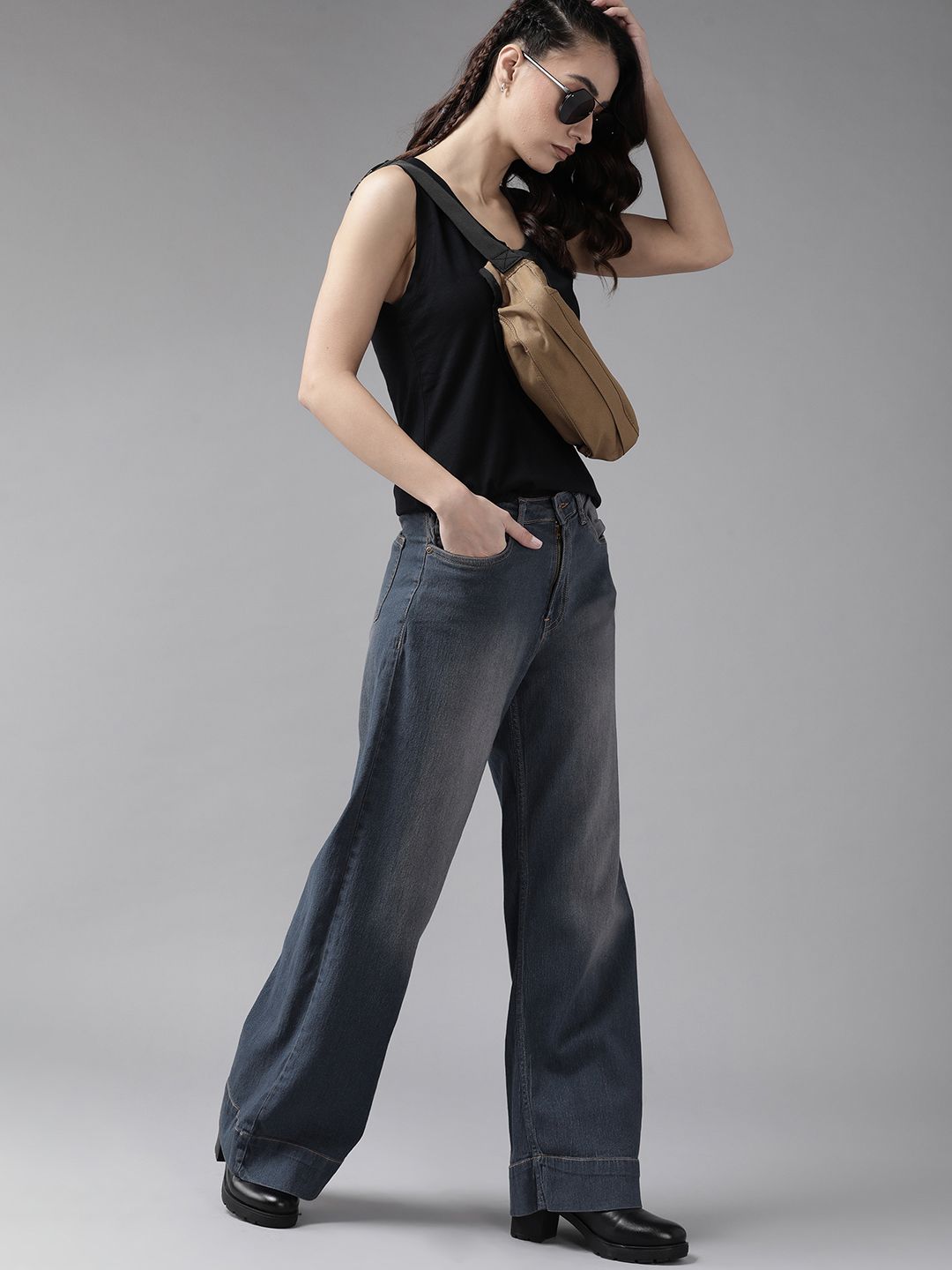 The Roadster Lifestyle Co Women Navy Blue Wide Leg Light Fade Stretchable Jeans Price in India