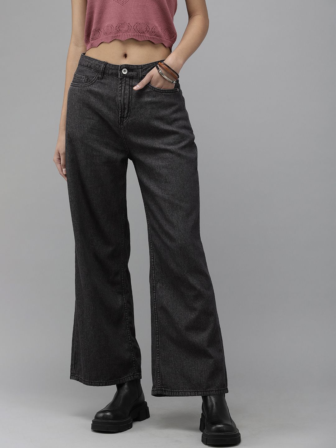 The Roadster Lifestyle Co. Women Black Light Fade Flared Stretchable Jeans Price in India