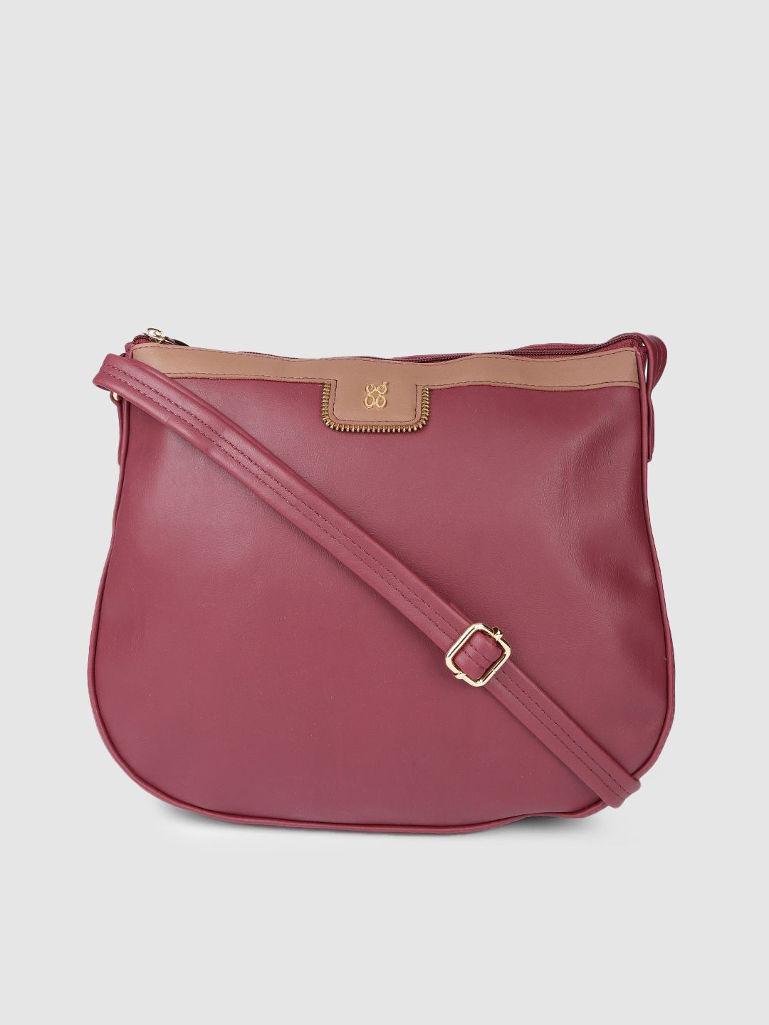 Baggit Burgundy Solid Synthetic Regular Structured Sling Bag Price in India