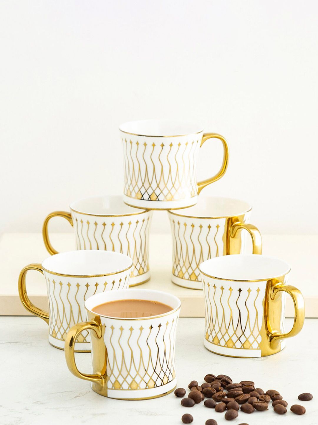 Home Centre Set Of 6 White & Gold-Toned Printed Bone China Matte Mugs Price in India